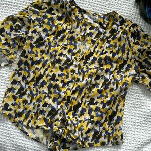 Blouse with ties at bottom